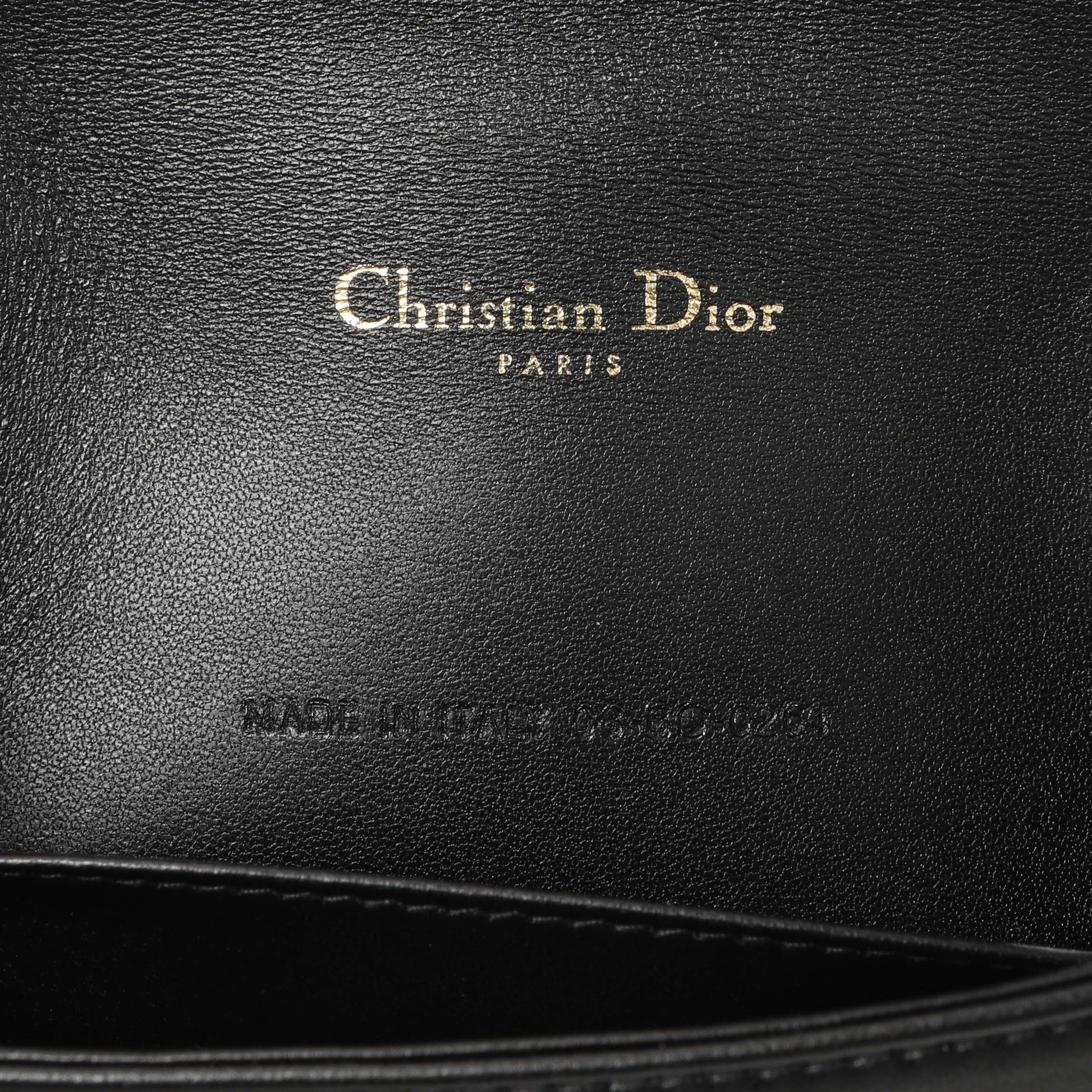 Exclusive Christian Dior Black Lambskin Cannage Lady Dior Pouch — Lifestyle View