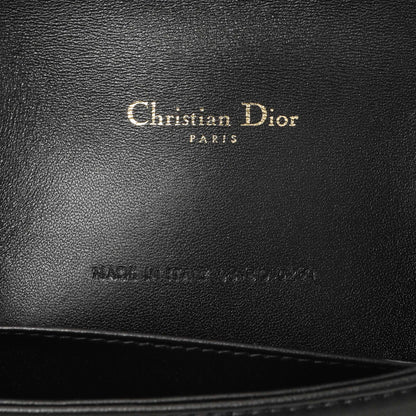 Exclusive Christian Dior Black Lambskin Cannage Lady Dior Pouch — Lifestyle View