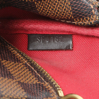 Exclusive Louis Vuitton Damier Ebene Mini Pochette Accessories — Lifestyle View