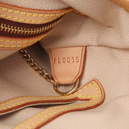 Exclusive Louis Vuitton Monogram Petit Bucket 23 — Lifestyle View