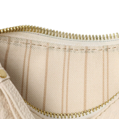 Exclusive Louis Vuitton Empreinte Easy Pouch On Strap — Lifestyle View