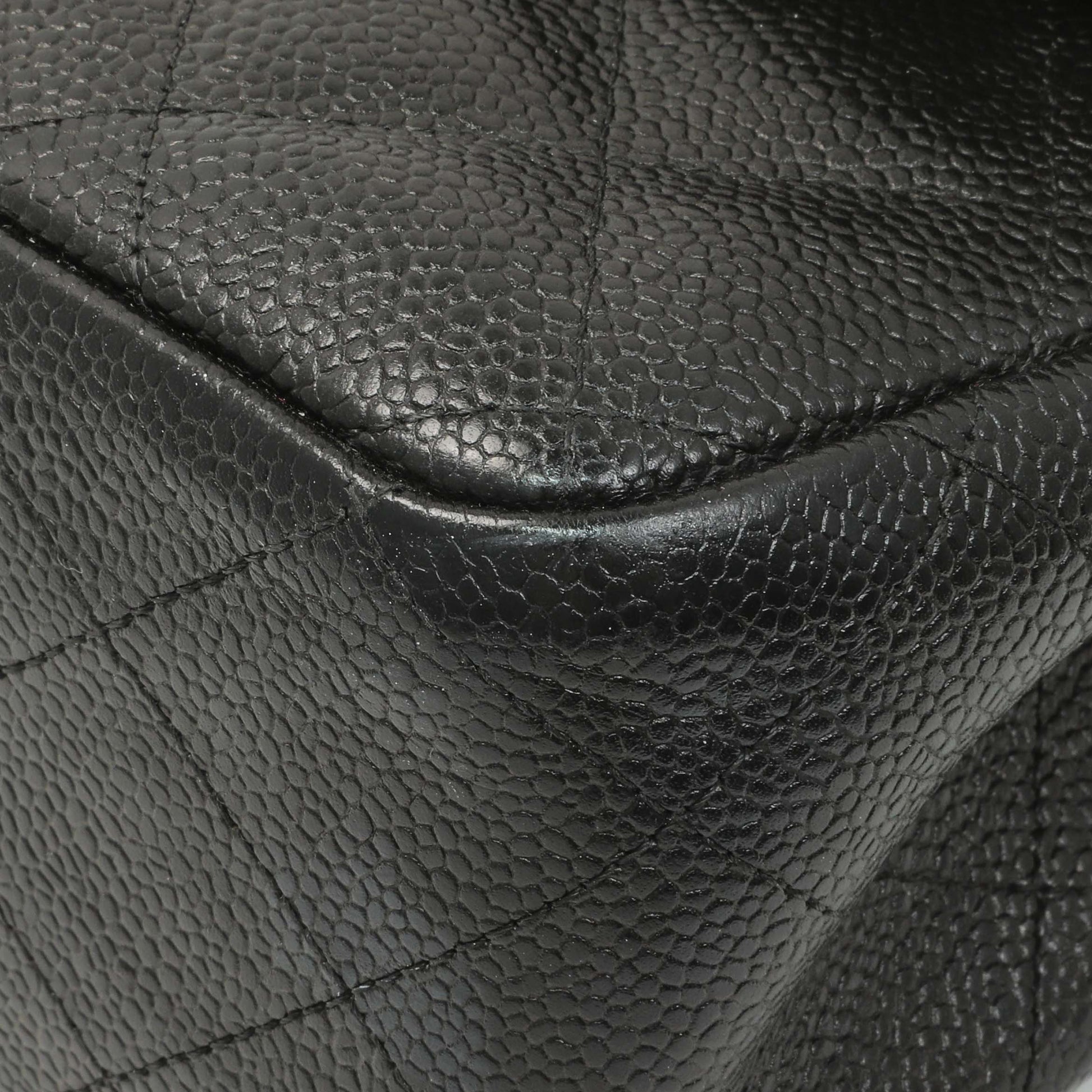 Exclusive Chanel Black Quilted Caviar Jumbo Double Flap — Detail View