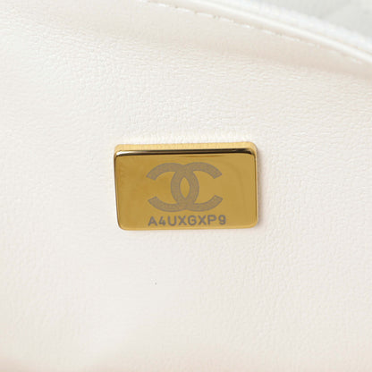 Exclusive Chanel White Quilted Caviar Jumbo Double Flap — Lifestyle View