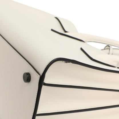 Exclusive Saint Laurent White Calfskin Small Sac De  Jour — Lifestyle View