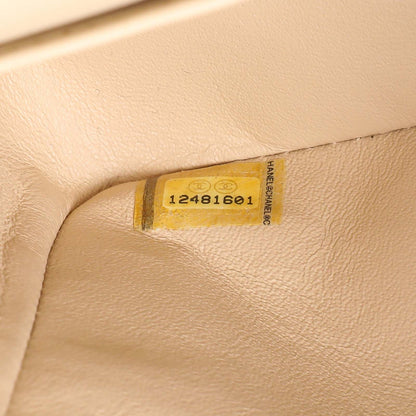 Exclusive Chanel Beige Caviar Medium Classic Flap — Lifestyle View
