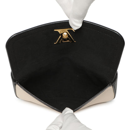Exclusive Louis Vuitton Black Grained Calfskin Lockme Chain Phone Pouch — Top View