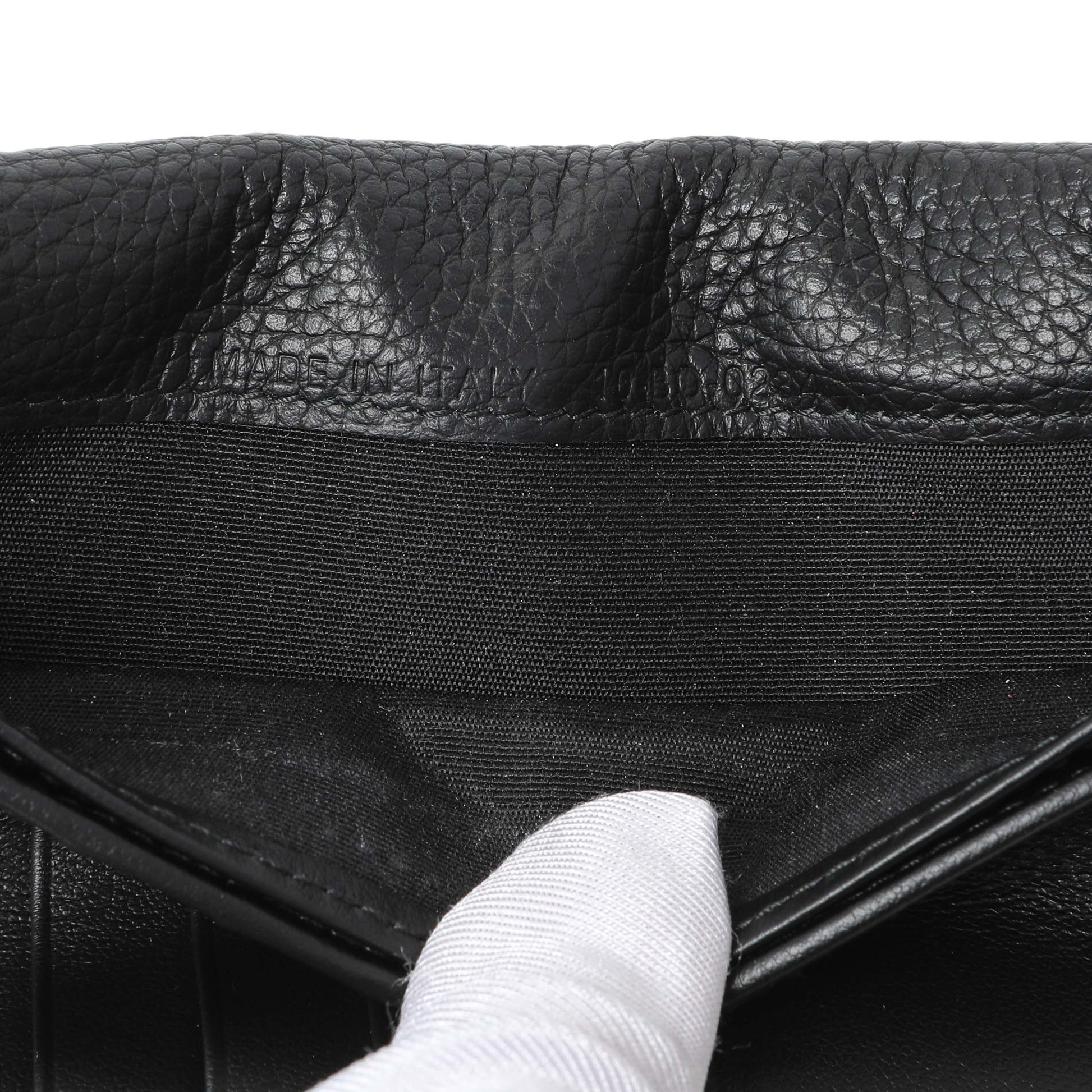 Exclusive Christian Dior Black Calfskin Icon Vertical Wallet — Lifestyle View