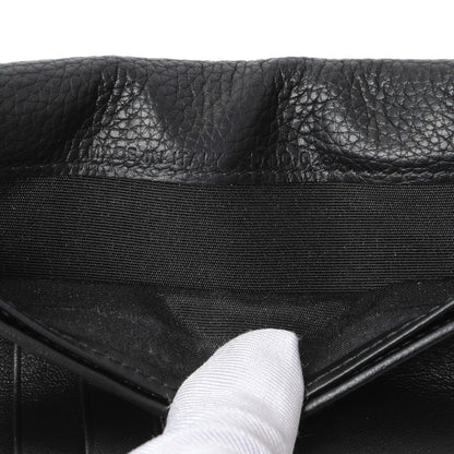 Exclusive Christian Dior Black Calfskin Icon Vertical Wallet — Lifestyle View