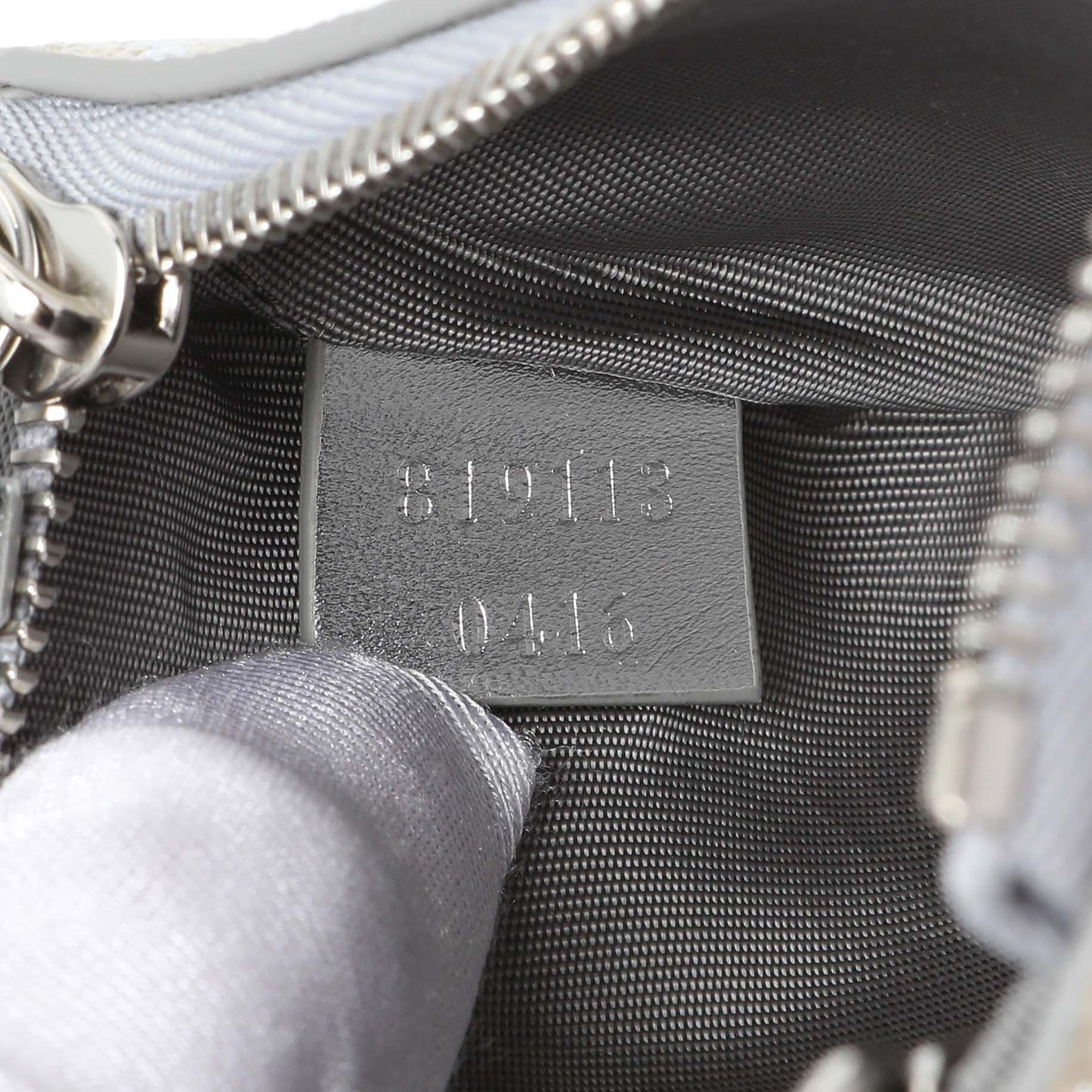 Exclusive Gucci Emblem Key Pouch — Lifestyle View