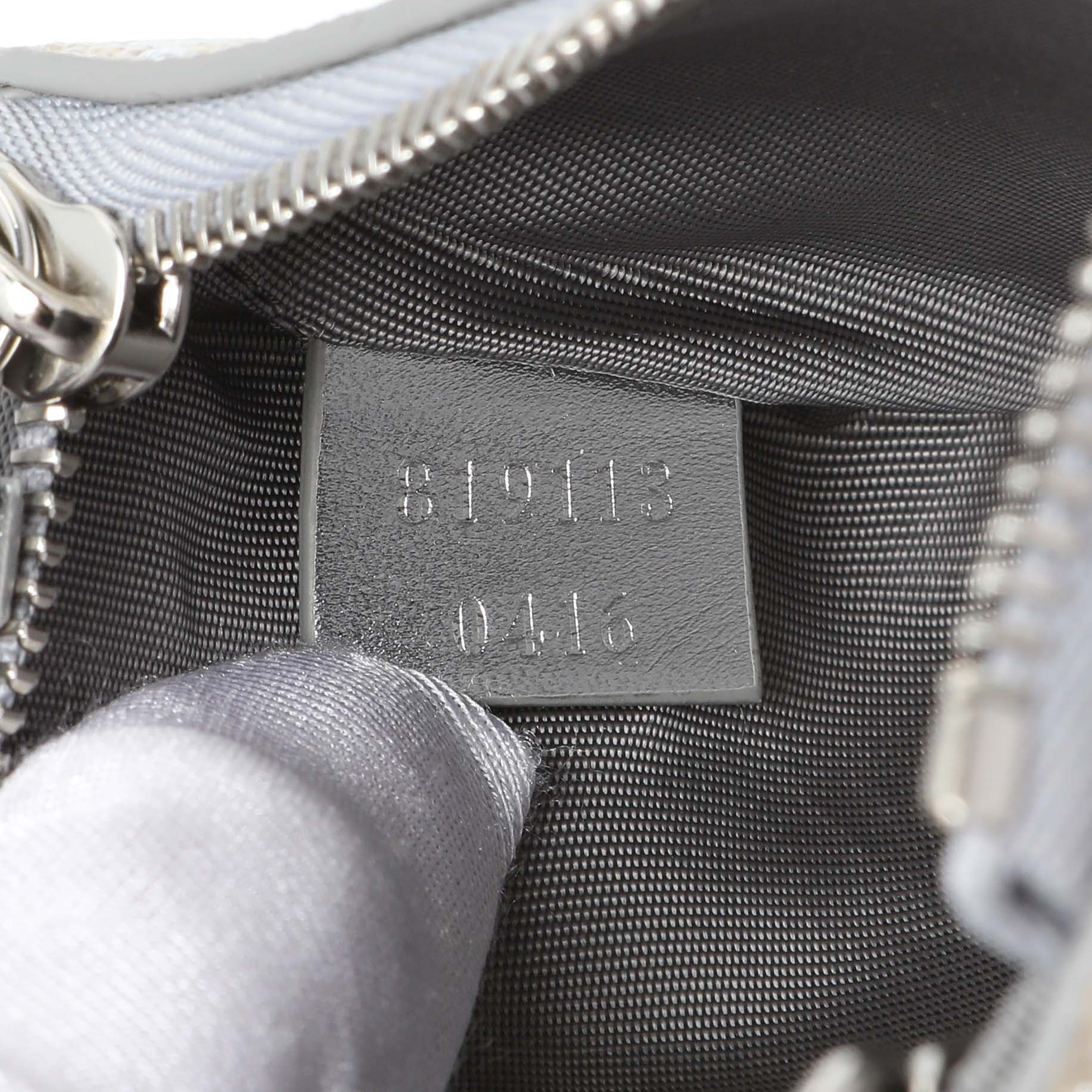 Exclusive Gucci Emblem Key Pouch — Lifestyle View