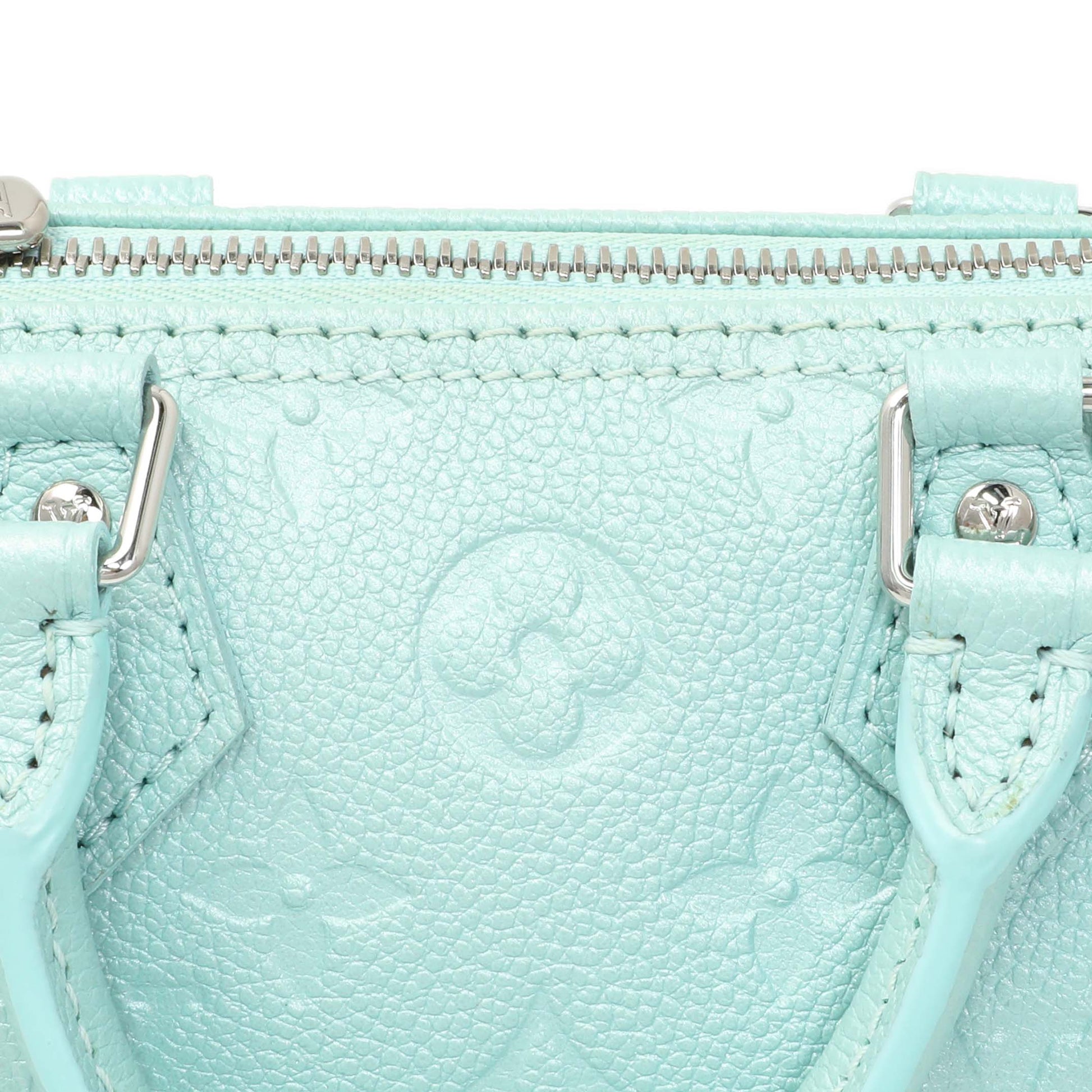 Exclusive Louis Vuitton Pearly Lagoon Turquoise Empreinte Monogram Nano Speedy — Lifestyle View