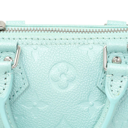 Exclusive Louis Vuitton Pearly Lagoon Turquoise Empreinte Monogram Nano Speedy — Lifestyle View