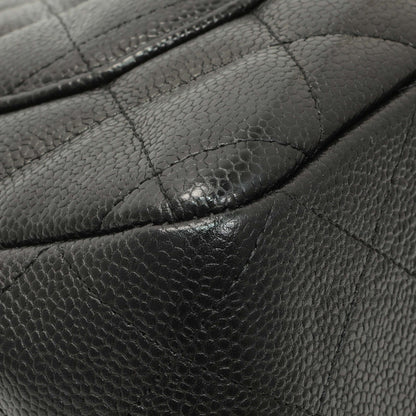 Exclusive Chanel Black Quilted Caviar Jumbo Single Flap — Lifestyle View