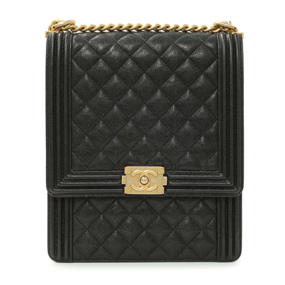 Exclusive Chanel Black Quilted Caviar North South Boy Flap — Side View