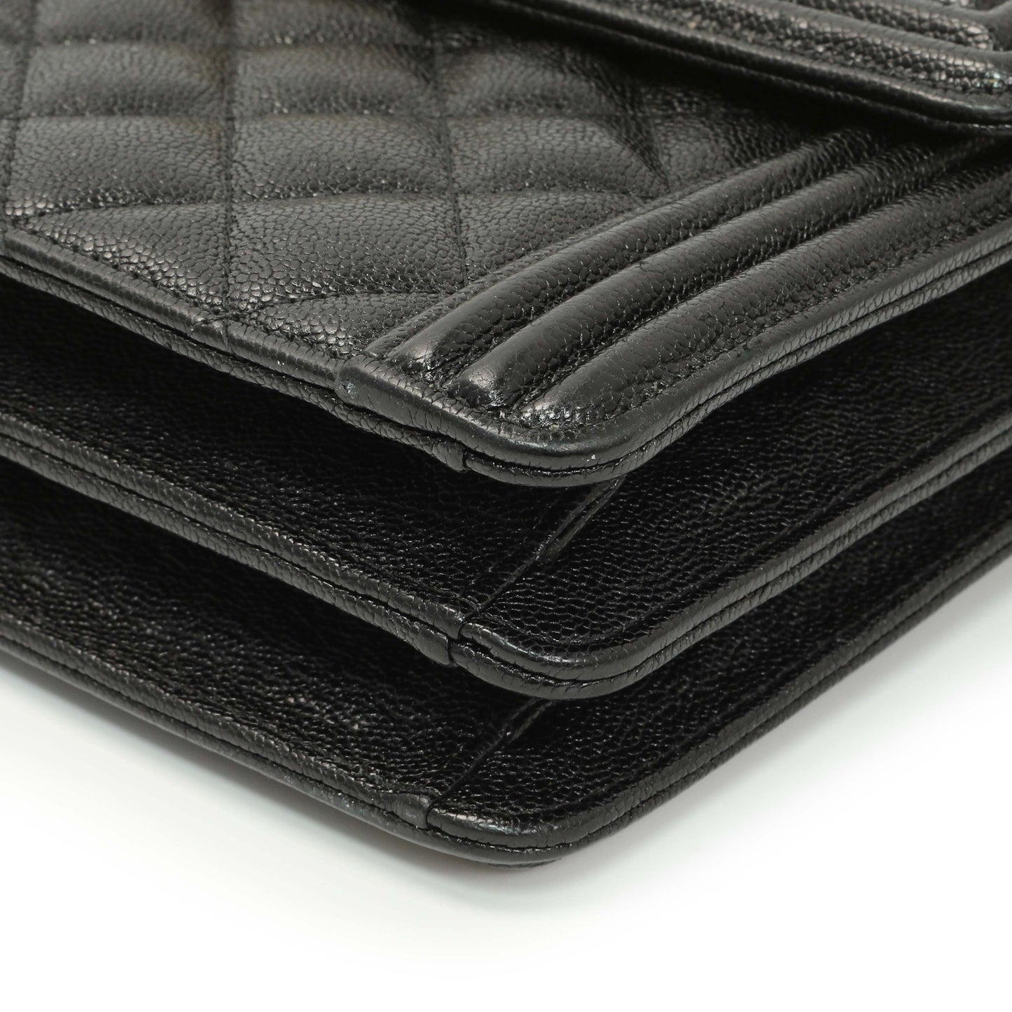 Exclusive Chanel Black Quilted Caviar North South Boy Flap — Lifestyle View