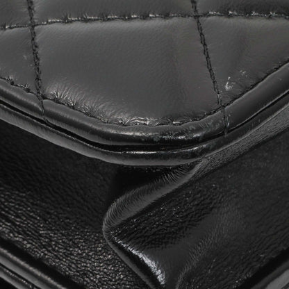 Exclusive Chanel Black Quilted Shiny Lambskin Golden Links Wallet on Chain — Lifestyle View