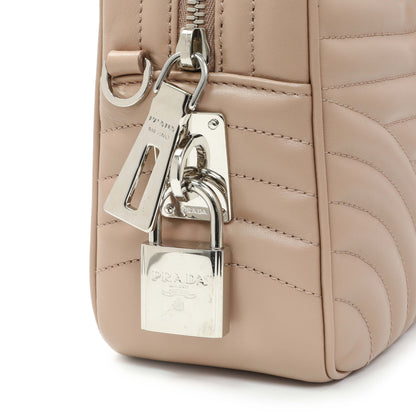 Exclusive Prada Cipria Soft Calfskin Impunture Diagramme Top Handle Crossbody Bag — Lifestyle View