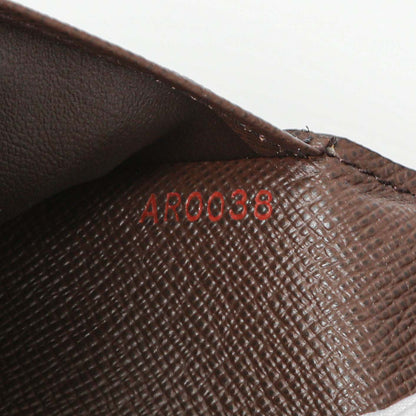 Exclusive Louis Vuitton Damier Ebene Porte-Valeurs Wallet — Lifestyle View