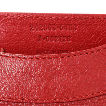 Exclusive Balenciaga Rouge Grained Chevre Leather Holiday Hip Bag — Lifestyle View