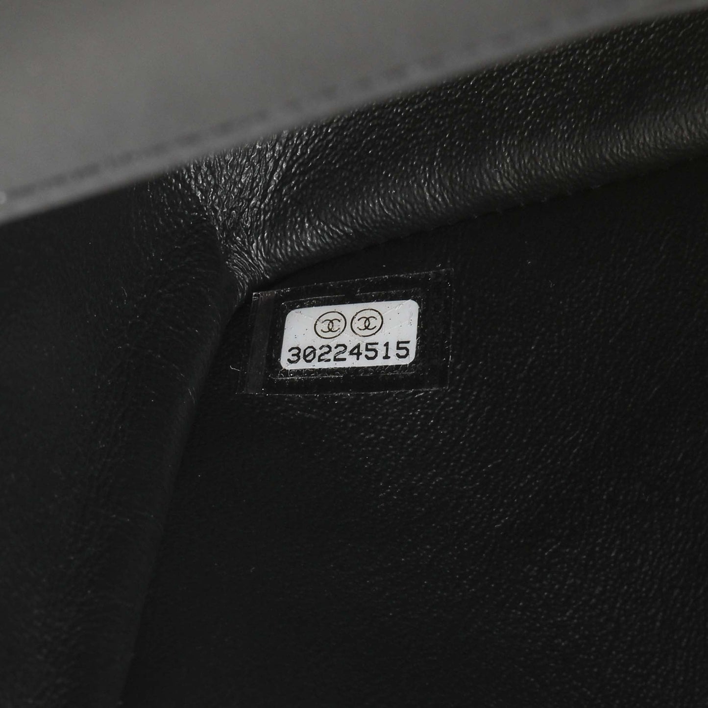 Exclusive Chanel Black Aged Calfskin Chevron 2.55 Reissue Flap 224 — Lifestyle View