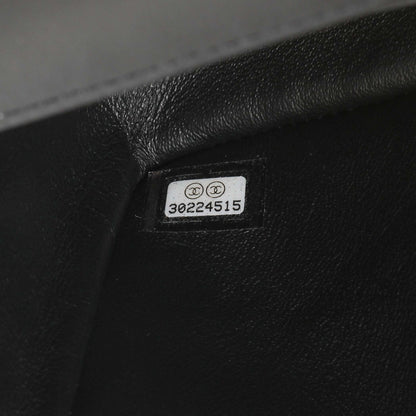 Exclusive Chanel Black Aged Calfskin Chevron 2.55 Reissue Flap 224 — Lifestyle View