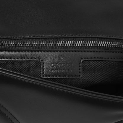 Exclusive Gucci Black Calfskin Matelasse Monochrome Small GG Marmont Shoulder Bag — Lifestyle View