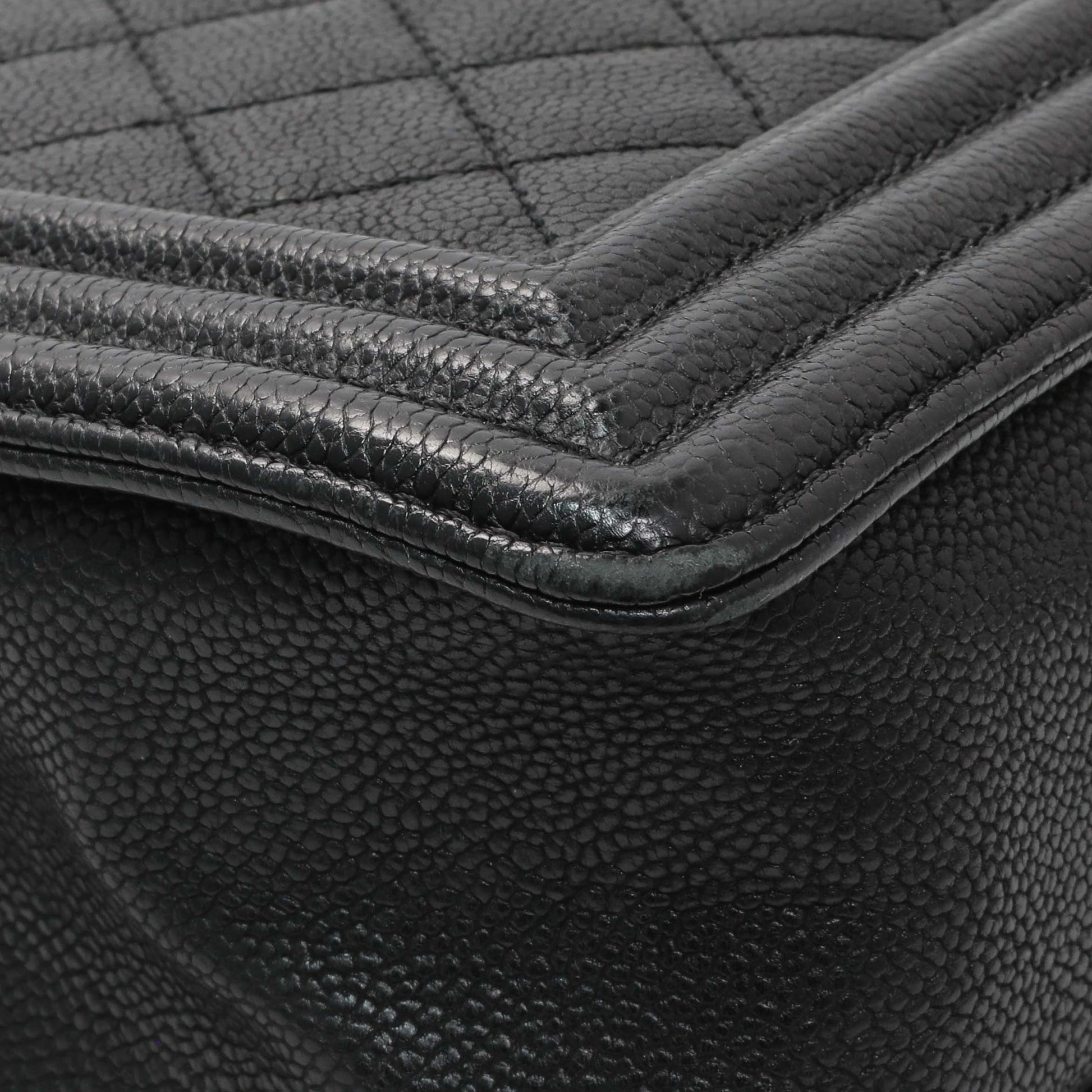 Exclusive Chanel Black Quilted Caviar New Medium Boy Bag — Lifestyle View