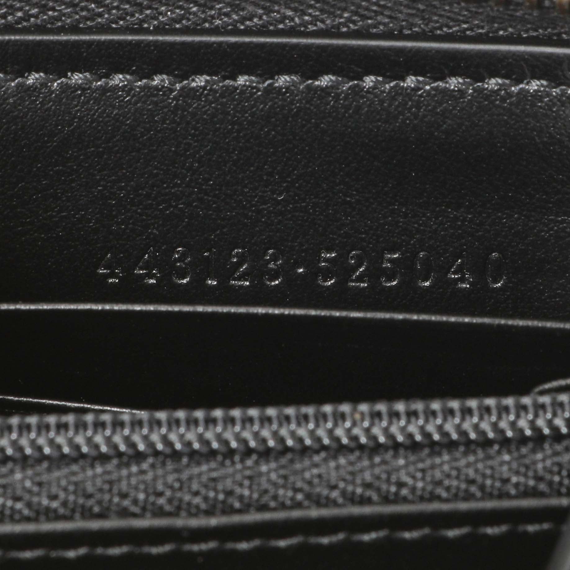 Exclusive Gucci Black Calfskin Matelasse GG Marmont Zip Around Wallet — Lifestyle View