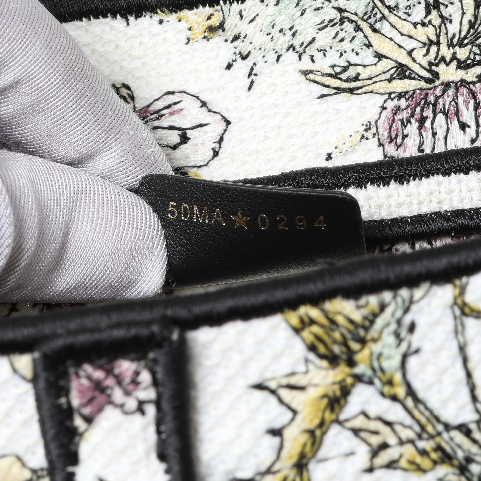 Exclusive Christian Dior White Floral Embroidered Saddle Bag — Lifestyle View