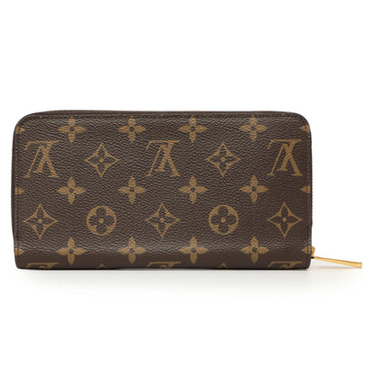 Exclusive Louis Vuitton Monogram Fuchsia Zippy Wallet — Side View