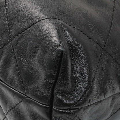 Exclusive Chanel Black Shiny Calfskin Quilted Small Chanel 22 — Detail View