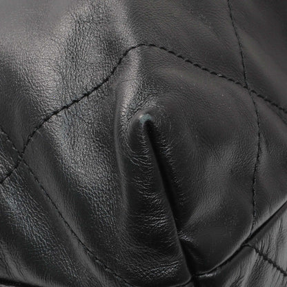 Exclusive Chanel Black Shiny Calfskin Quilted Small Chanel 22 — Lifestyle View