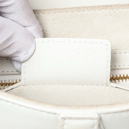 Exclusive Christian Dior White Ultra Matte Calfskin Saddle Bag — Lifestyle View