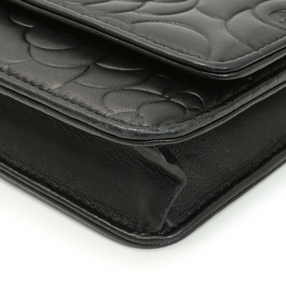 Exclusive Chanel Black Lambskin Camellia Embossed Wallet on Chain — Detail View