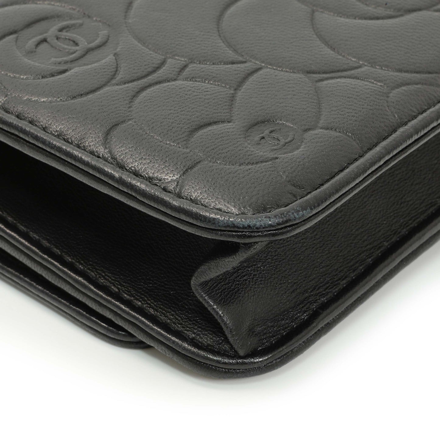 Exclusive Chanel Black Lambskin Camellia Embossed Wallet on Chain — Lifestyle View