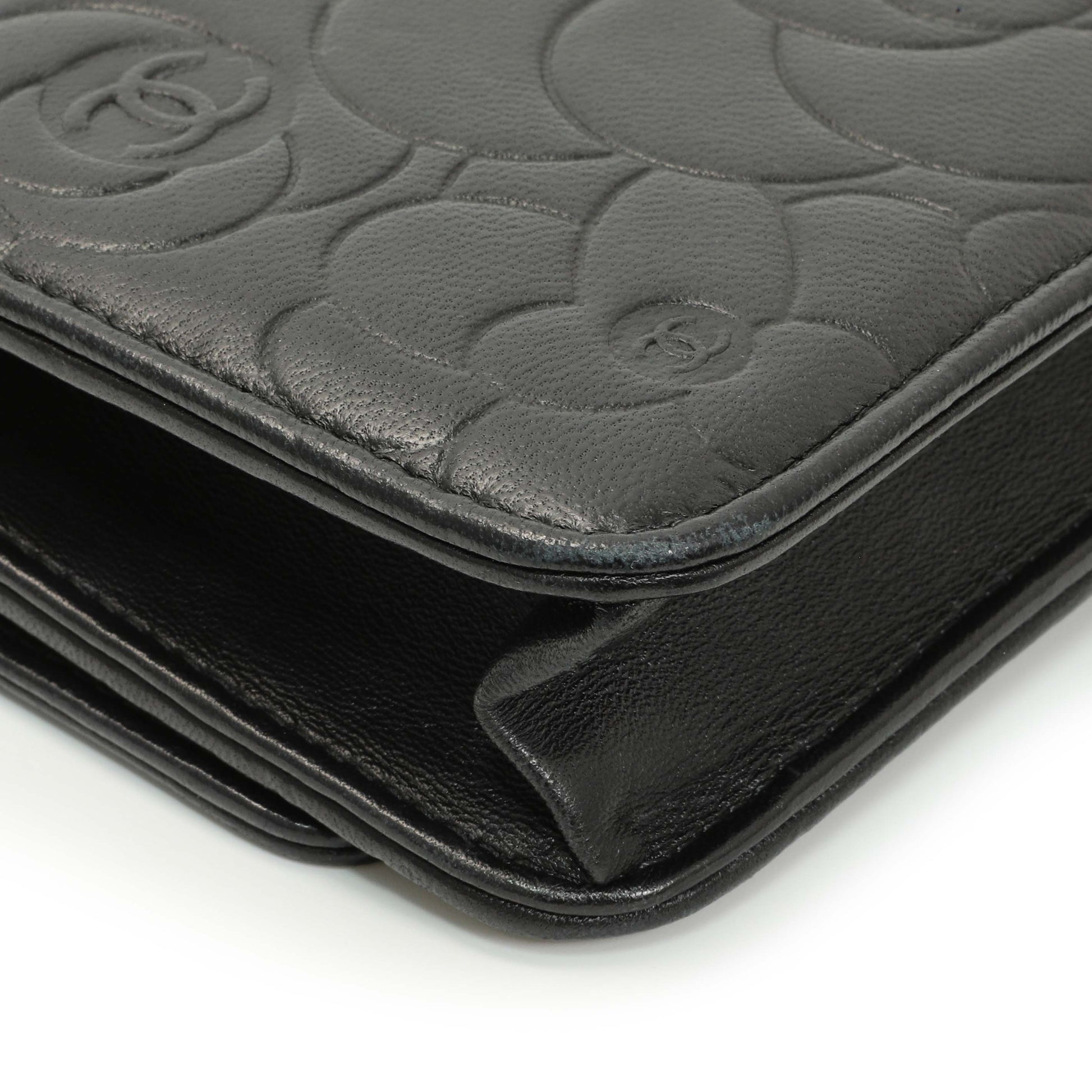 Exclusive Chanel Black Lambskin Camellia Embossed Wallet on Chain — Lifestyle View