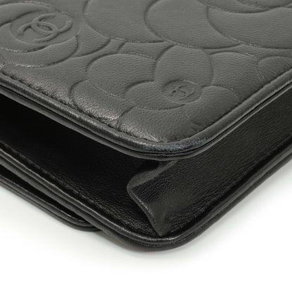 Exclusive Chanel Black Lambskin Camellia Embossed Wallet on Chain — Lifestyle View