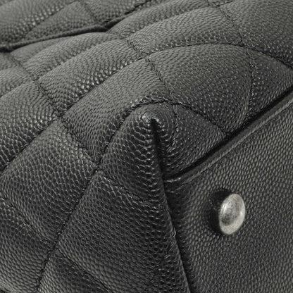 Exclusive Chanel Black Quilted Caviar Small Coco Handle — Lifestyle View