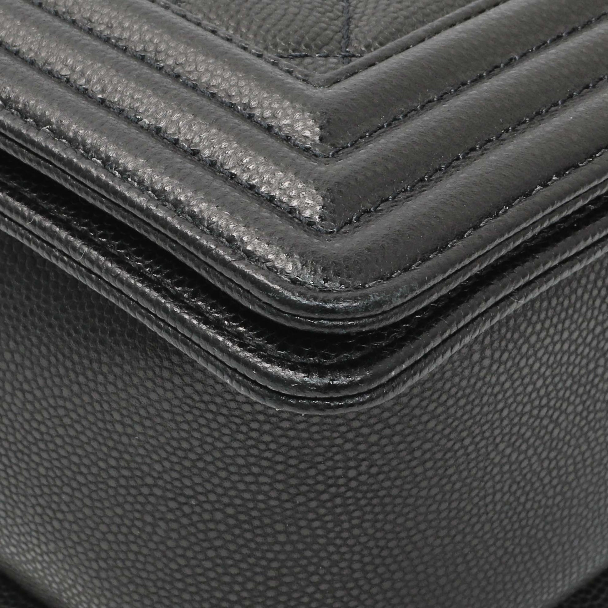 Exclusive Chanel Black Quilted Caviar New Medium Boy Flap — Lifestyle View