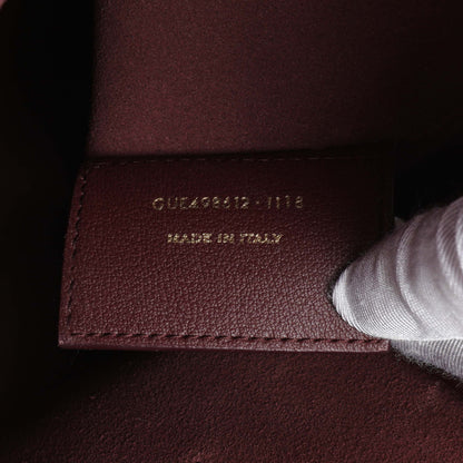 Exclusive Saint Laurent Dark Red Calfskin Toy Shopping Tote — Lifestyle View