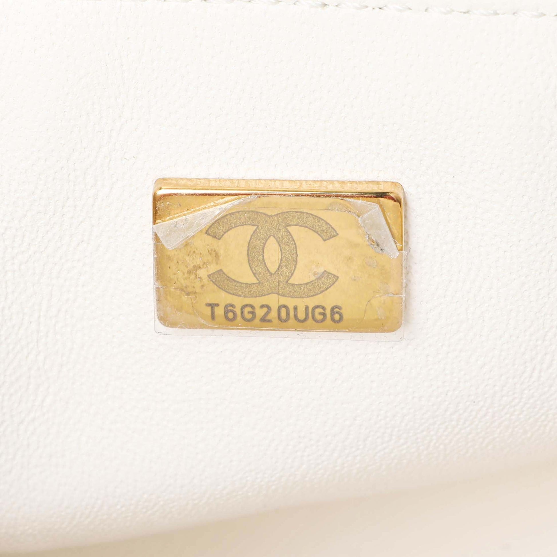 Exclusive Chanel White Quilted Aged Calfskin 2.55 Reissue Flap 224 — Lifestyle View