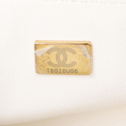 Exclusive Chanel White Quilted Aged Calfskin 2.55 Reissue Flap 224 — Lifestyle View