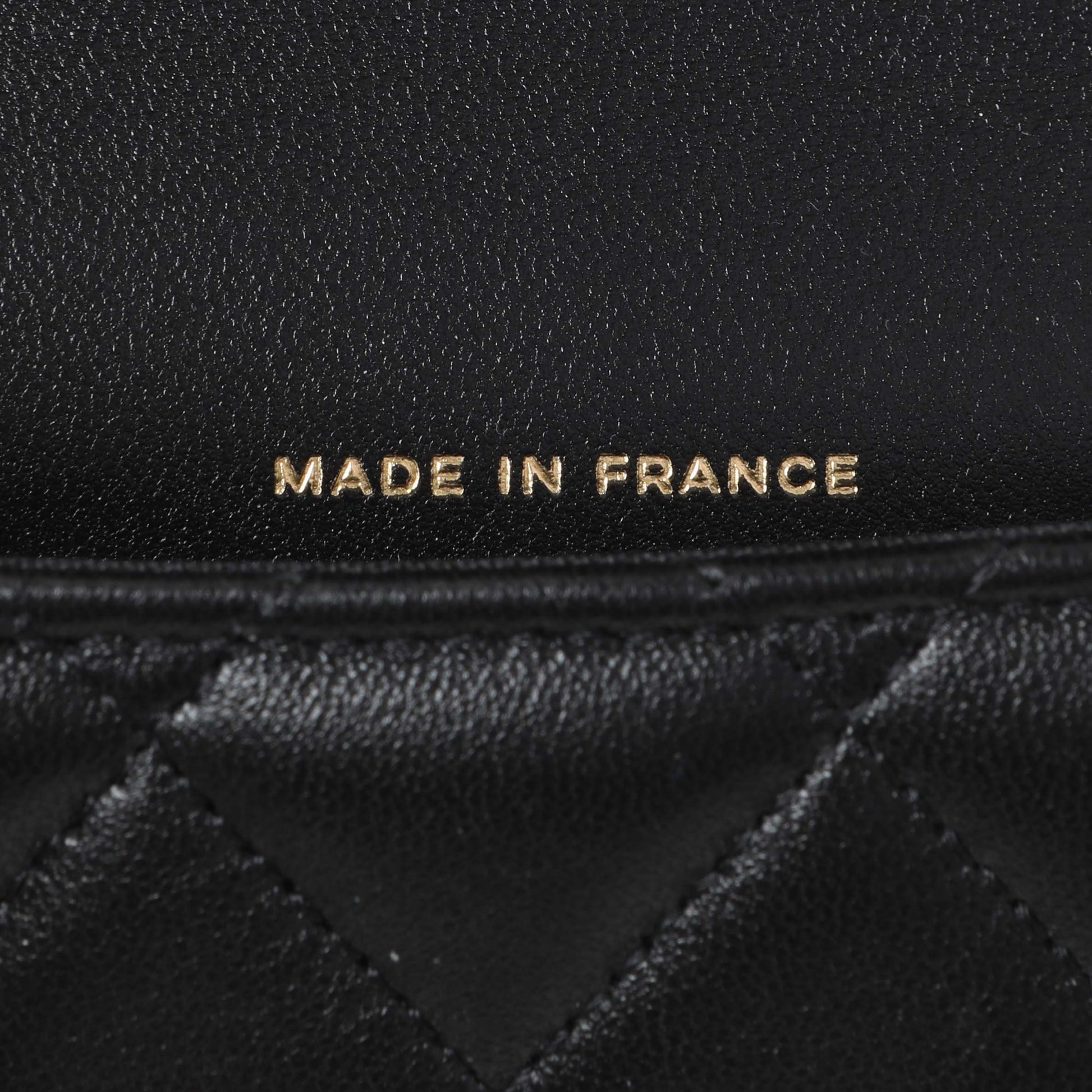 Exclusive Chanel Black Lambskin Top Handle Flap Coin Purse With Chain — Lifestyle View