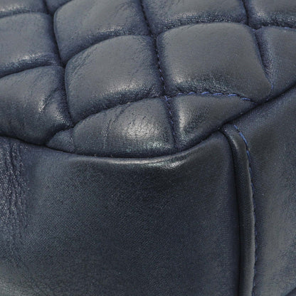 Exclusive Chanel Blue Iridescent Calfskin Bubble Flap — Lifestyle View