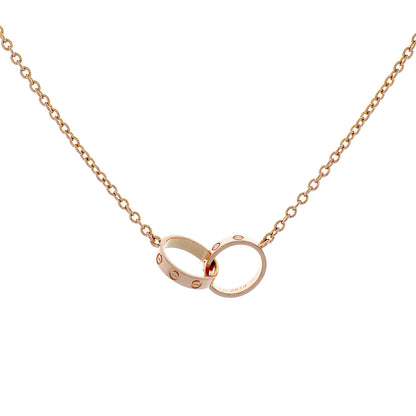 Exclusive Cartier 18K Rose Gold Interlocking Love Necklace — Side View