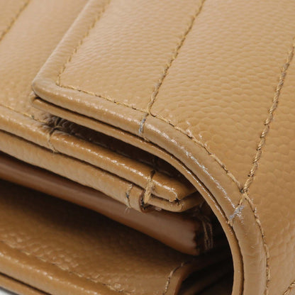 Exclusive Saint Laurent Brown Grain De Poudre Matelasse Chevron Monogram Flap Wallet — Lifestyle View