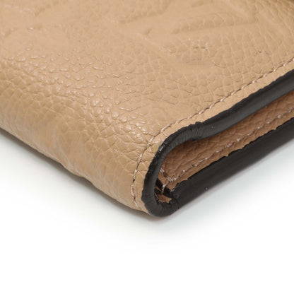 Exclusive Louis Vuitton Beige Empreinte Zoe Wallet — Detail View
