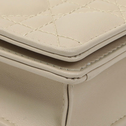 Exclusive Christian Dior Beige Lambskin Cannage Lady Dior Pouch — Lifestyle View