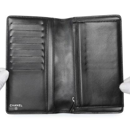 Exclusive Chanel Black Lambskin Camellia Embossed Yen Wallet — Top View
