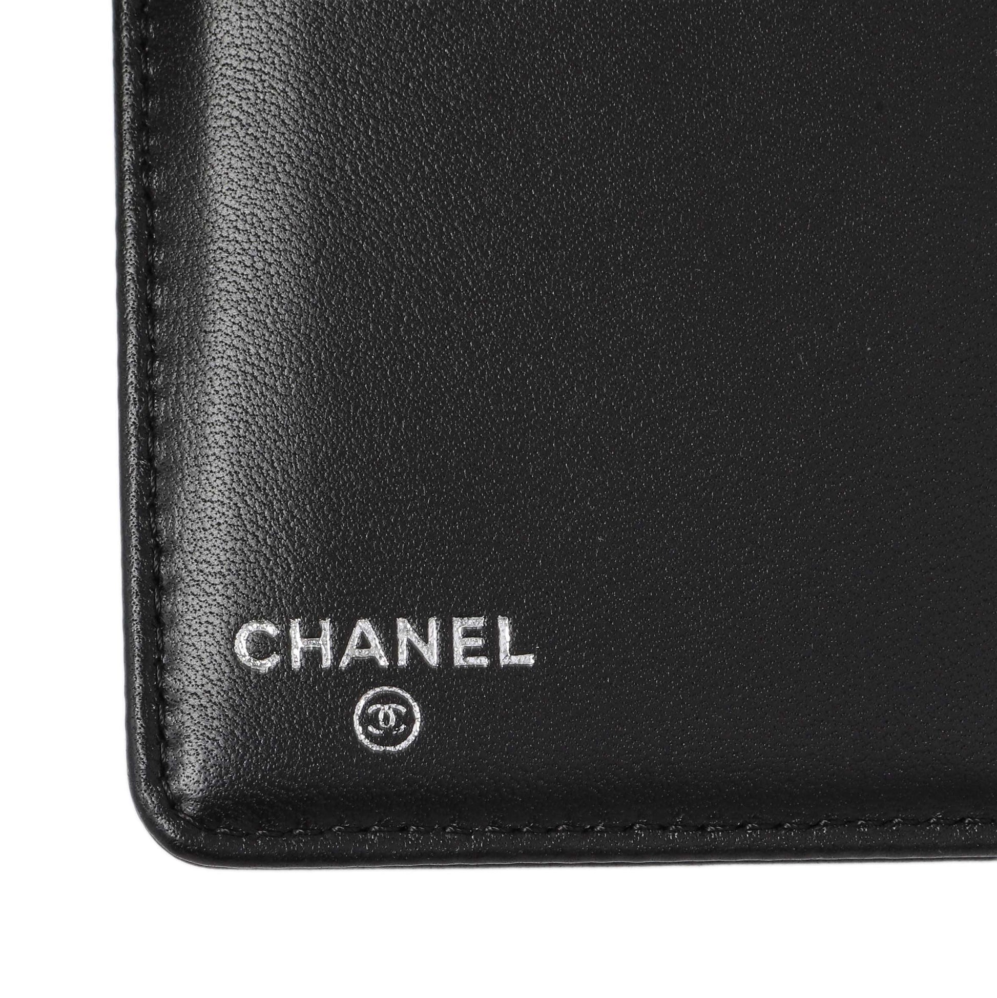 Exclusive Chanel Black Lambskin Camellia Embossed Yen Wallet — Detail View